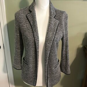 Skies are blue. Size small ladies blazer.